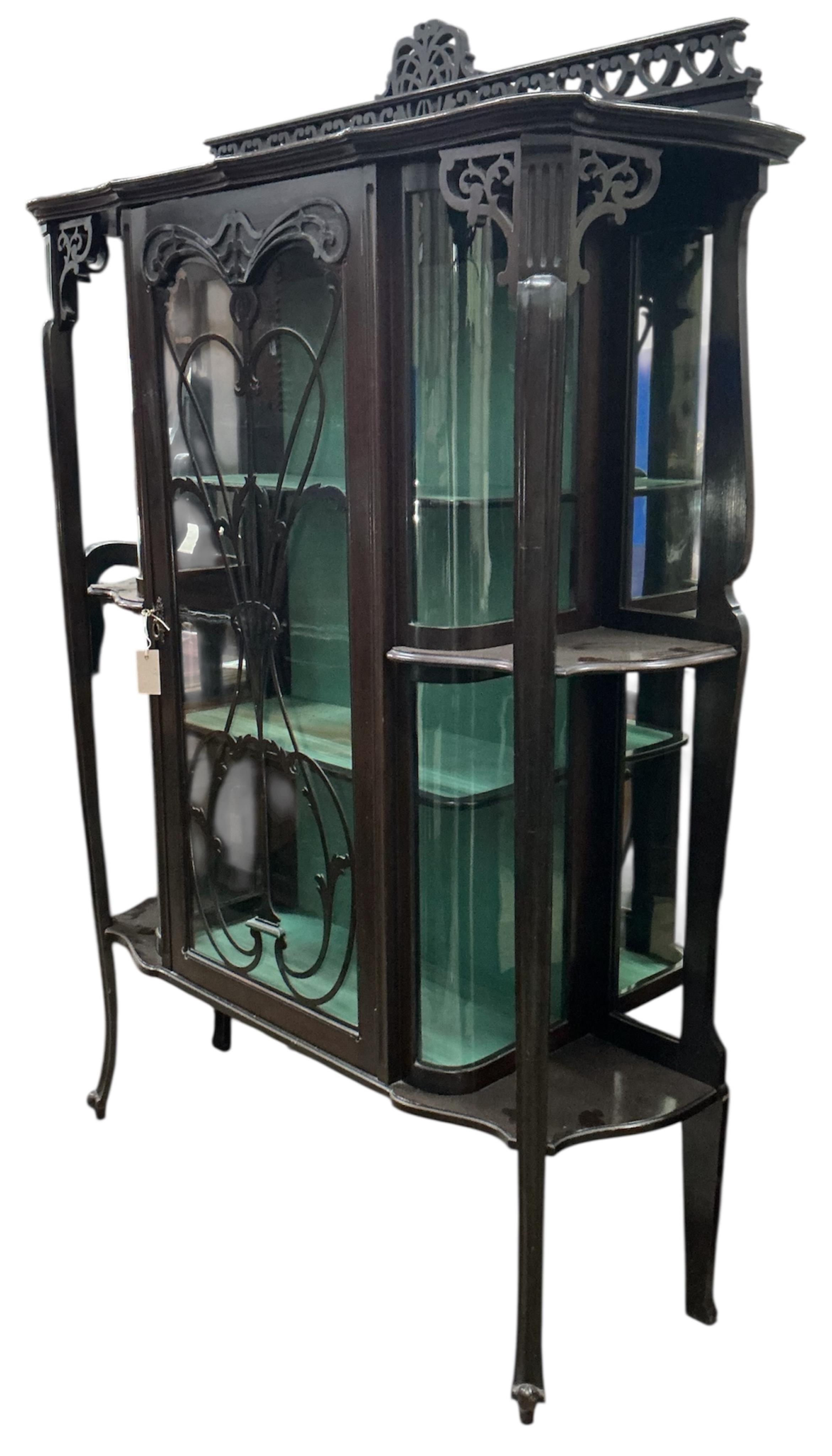 A late Victorian mahogany display cabinet, width 126cm, depth 38cm, height 182cm